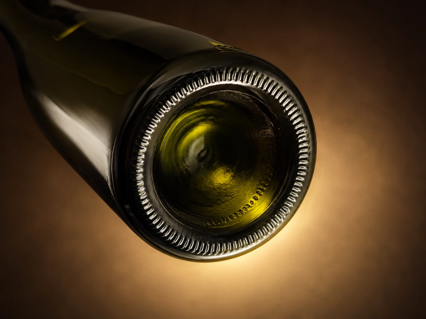 Bottom view of a wine bottle showing the deep indentation called a punt