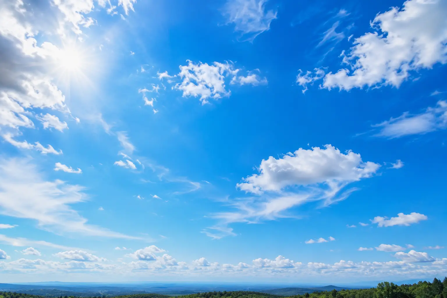 Clear blue sky with sunlight scattering through the atmosphere